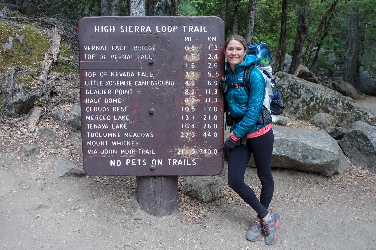 A backpacker in the Arc’teryx Essent High-Rise Leggings on the High Sierra Loop Trail