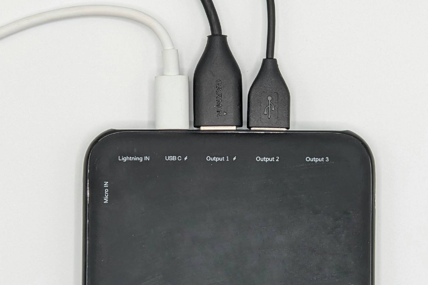 A close up of the charging ports on the Charmast 26800 power bank